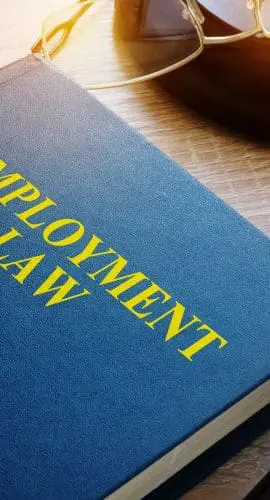 Employment Law Concept. Book And Gavel On A Desk.