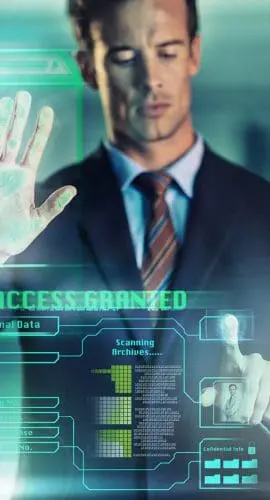 A man in a suit is interacting with a futuristic transparent touchscreen displaying "Access Granted" and other digital information.