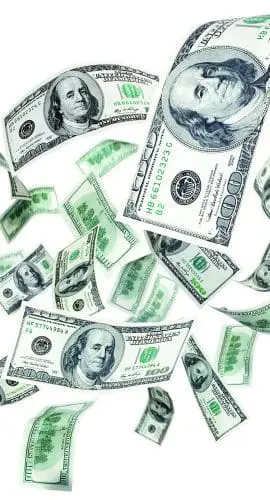 US dollar bills are flying and scattered in the air.