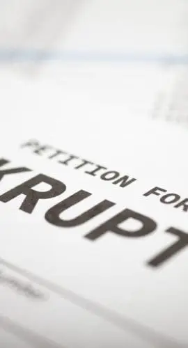 A bankruptcy petition form is being filled out.