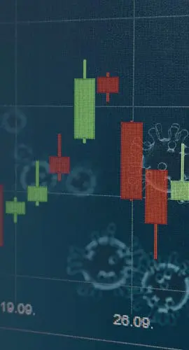 A financial chart with candlestick patterns is overlaid with images of viruses.