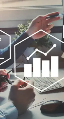 Two people working at a desk with a computer displaying charts and graphs, overlaid with various financial and analytical icons.