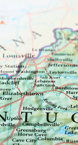 A map of Kentucky is displayed with a red pushpin marking a specific location.