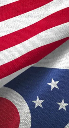 Two flags, one of the United States and one of Ohio, are shown overlapping.