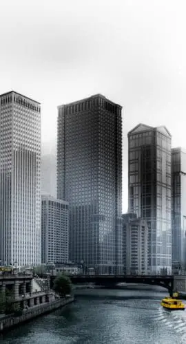 Photo of boat going through river in between highrise buildings