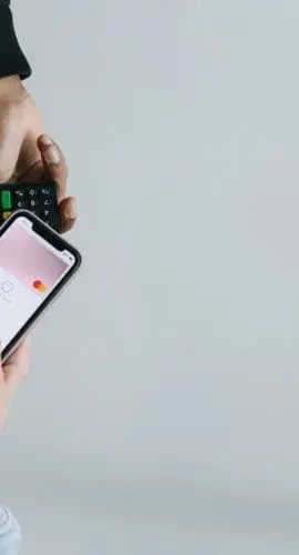 A person paying using a smartphone