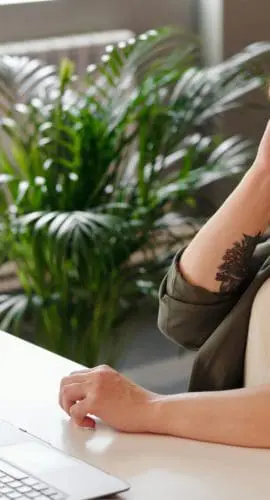 Photo of woman holding her head