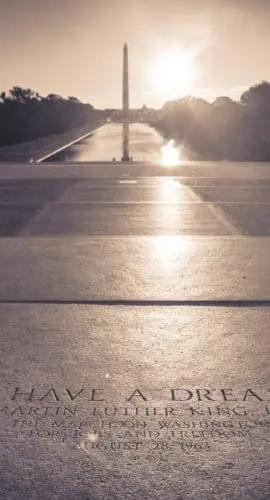 Washington D.C., USA - September 23, 2012: Martin Luther King quote inscription on the steps of the Lincoln Memorial on The National Mall.  "I Have a Dream" was a public speech delivered by American civil rights activist Martin Luther King Jr. on August 28, 1963, in which he calls for an end to racism in the United States. Delivered to over 250,000 civil rights supporters from the steps of the Lincoln Memorial during the March on Washington, the speech was a defining moment of the American Civil Rights Movement.