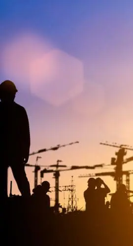Silhouette of engineer and construction team working at site over blurred background for industry background with Light fair.Create from multiple reference images together