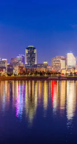 Cincinnati, Ohio, USA skyline on the river at dusk.