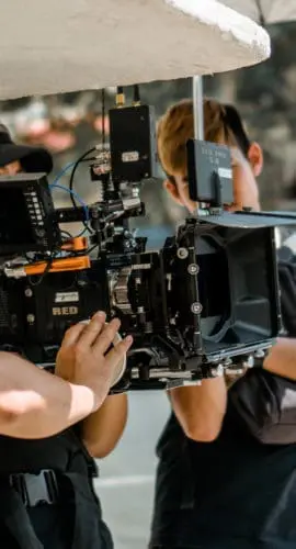 Photo of man holding camera