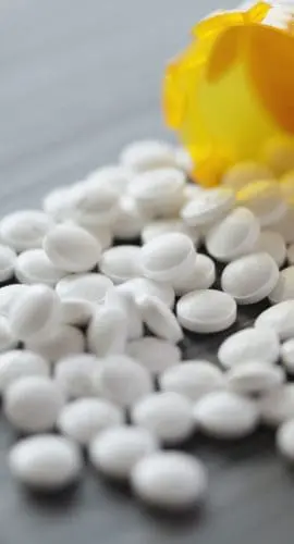 white pills spilled on table