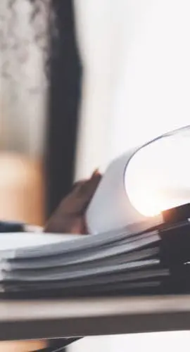 Lawyer business woman working or reading lawbook in office workplace for consultant lawyer concept.