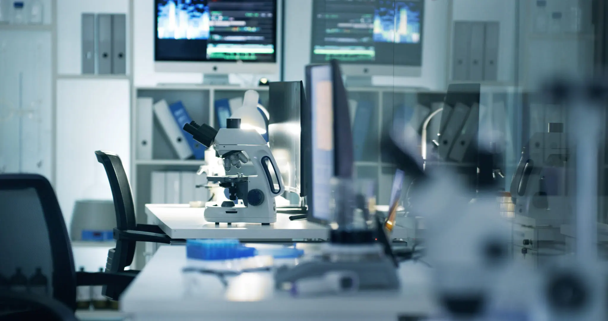 Scientific, research and medical labratory where scientists conduct experiments and do analysis. Empty lab with microscope and science equipment technology for learning and testing for biochemistry