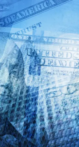 Money, finance, business concept background. USD dollar bills, skyscrapers.