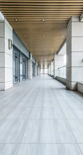 Modern retail shopping center representing leasehold mortgage financing, commercial lending, and real estate deals between landlords and tenants.